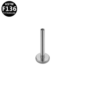 Macro view of ASTM F136 titanium internally threaded labret post with a flat base