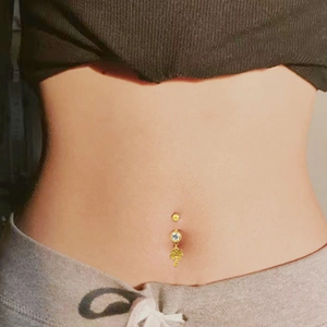 Golden stainless steel belly button ring with palm tree pendant and white zircon stud