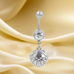 Detailed view of stainless steel belly ring featuring shell pendant with cubic zirconia
