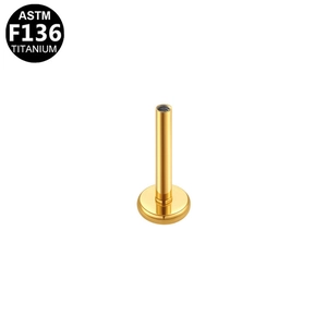 Detailed view of ASTM F136 titanium gold labret post with internal thread and flat back disc