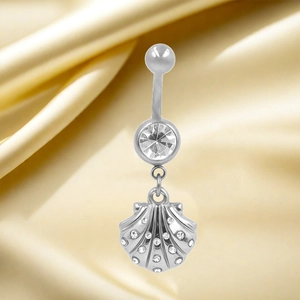 Detail of silver shell pendant belly button ring with zircons on satin background