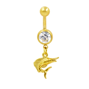 Macro view of a gold belly piercing ring featuring a sparkling gem and marlin fish pendant
