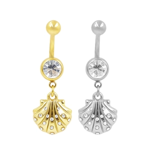 Detail view of gold and silver shell belly rings with white cubic zirconia stones