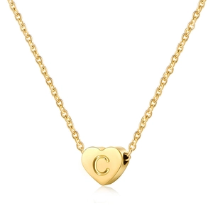 Polished gold heart pendant necklace with engraved letter C on a delicate cable chain