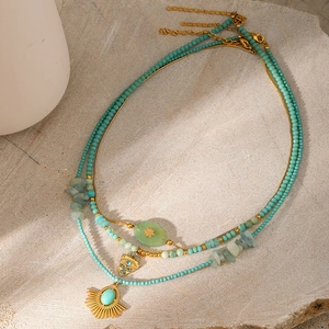 Dreilagiges Boho-Halsketten-Set in Gold mit grünen Steinen und bösem Blick Anhängern