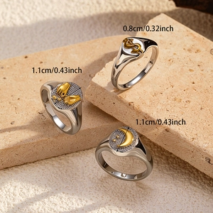 Three 18k gold plated stainless steel signet rings with dollar, moon, and hand symbols