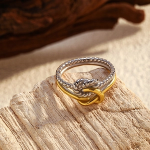 Bague nœud en acier inoxydable bicolore avec texture tressée argentée et finition dorée