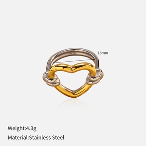Gros plan sur la bague nœud cœur bicolore avec dimensions et spécifications de poids