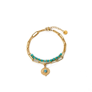 Double-layered gold stainless steel bracelet with turquoise beads and sun pendant