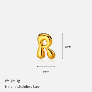 Close-up of polished gold letter R stainless steel pendant with dimensions 18mm by 14mm