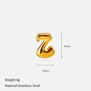 Detail of 3D gold stainless steel letter Z pendant with size markings and mirror finish