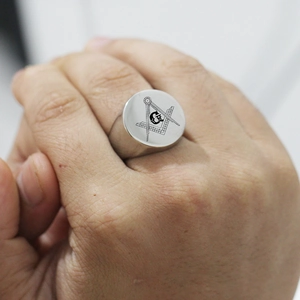 Silver 22mm Masonic signet ring featuring engraved compass and square on model hand