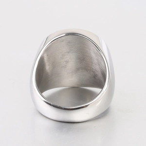 Detailed view of wide silver mirror polished stainless steel ring with smooth finish