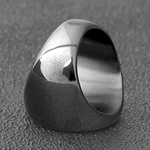Detail of 18mm square stainless steel ring with polished top and frosted side textures