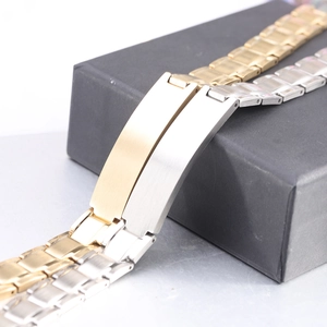 Detailed view of brushed stainless steel cross bracelets in gold and silver finish