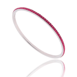 Detail view of a slim silver stainless steel bangle with rose red rhinestones inlay