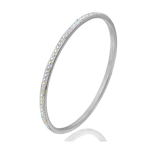 Silver stainless steel bangle with rainbow rhinestones shown at a 45-degree angle