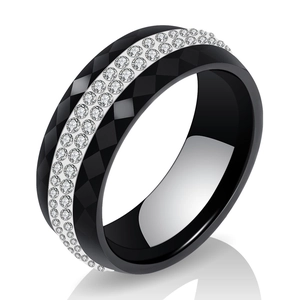 Modern 8mm black ceramic ring featuring geometric facets and triple row of clear crystals