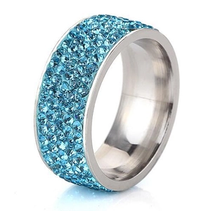 Detail view of 8mm silver band ring featuring five rows of shimmering light blue crystals