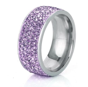 Detailed close-up of wide multi-row lavender rhinestone ring in silver metal
