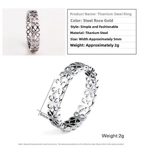 Detailed 5mm titanium steel rings with hollow heart patterns in silver and rose gold finishes