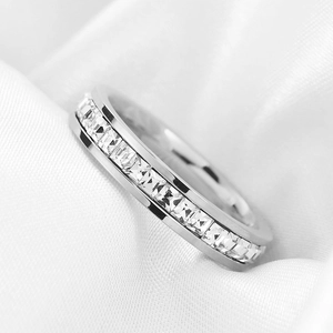 Elegant 4mm silver eternity ring featuring a full circle of square-cut cubic zirconia