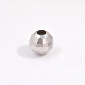 Macro view of faceted S925 sterling silver laser cut beads for DIY jewelry making