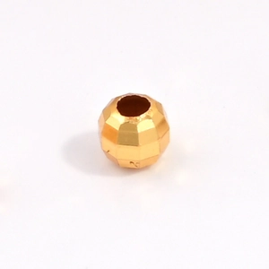 Macro shot of 18K gold plated S925 sterling silver faceted bead for DIY jewelry making