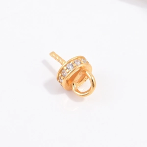 Macro shot of gold-plated S925 silver pendant clasp with cubic zirconia pave settings