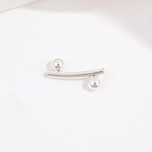 Detailed macro view of S925 sterling silver bamboo joint tube and polished round beads