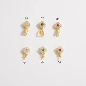 Macro shot of S925 silver flower charms with colorful zircon and gold plating details