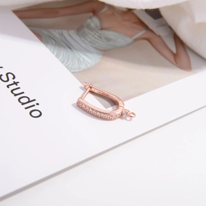 S925 sterling silver rose gold earring hoops with pave white zircon on fashion magazine
