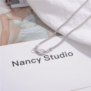Macro detail of S925 sterling silver popcorn chain necklace with sturdy lobster clasp