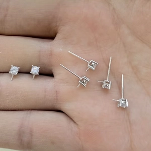 Macro detail of S925 sterling silver four-prong square settings for DIY jewelry making