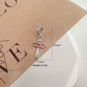 Detailed view of S925 sterling silver cupid angel charm with red enamel heart pendant