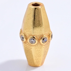 Distanziatore esagonale in argento S925 con finitura oro opaco e intarsio di zirconi