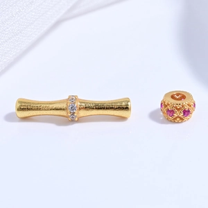Detail of S925 sterling silver gold-plated bamboo bead and hollow filigree bead