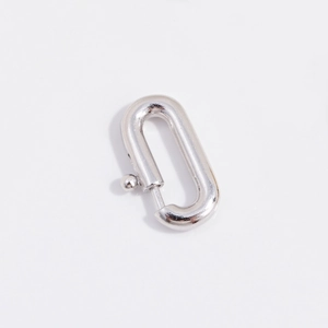 Close-up of polished S925 sterling silver oval spring clasp for DIY jewelry making