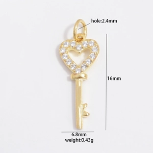 Gold S925 sterling silver heart key pendant with crystals measuring 16mm in height