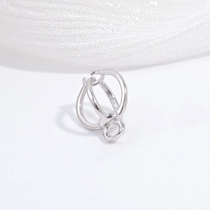 Macro shot of S925 sterling silver DIY pendant setting with polished interlaced rings