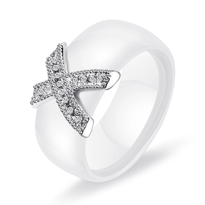 Elegant white ceramic ring featuring a silver X-shaped design set with sparkling zircons