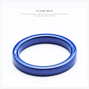 Close-up of a 3mm classic blue ceramic ring with a high-polished mirror finish
