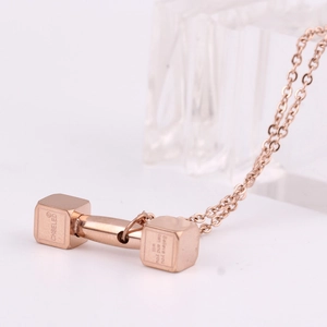 Rose gold dumbbell pendant necklace in stainless steel with inspirational engraving