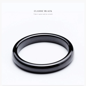 Close-up of polished black ceramic ring with 3mm width and high-gloss mirror finish