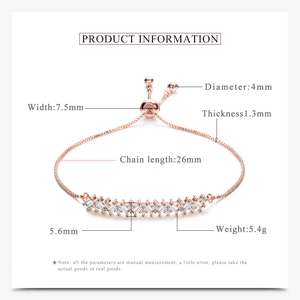 Detailansicht der Maße eines kreuzförmigen Roségold-Armbands mit Zirkoniasteinen