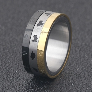Rotating 8mm stainless steel zodiac ring with tricolor black, silver, and gold bands