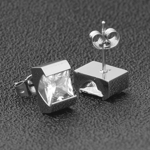 Close-up of square cut zircon earrings with silver stainless steel tension setting