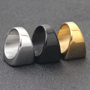 Three polished stainless steel square signet rings in silver, black and gold finishes