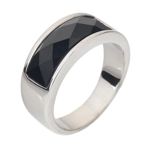 Detailed side view of stainless steel ring featuring a black faceted gemstone inlay