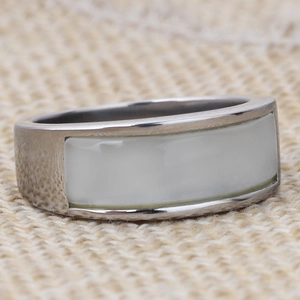 Modern stainless steel ring featuring a white rectangular inlay and brushed metal finish